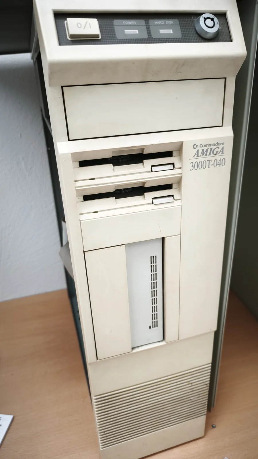 Commodore Amiga 3000T-040 tower case, with power switch, power and hard-disk LEDs, keylock, and two floppy drives.